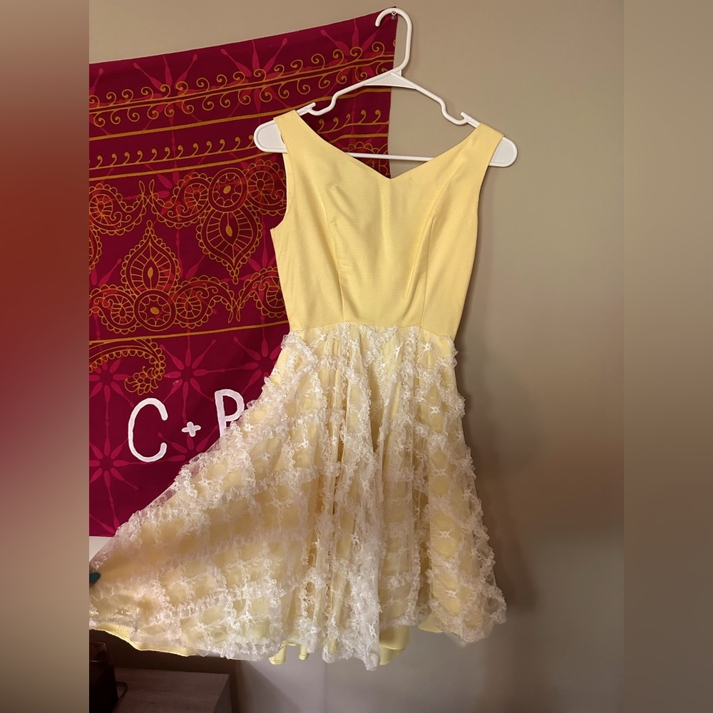 Vintage 1950s yellow swing dress with lace overlay!